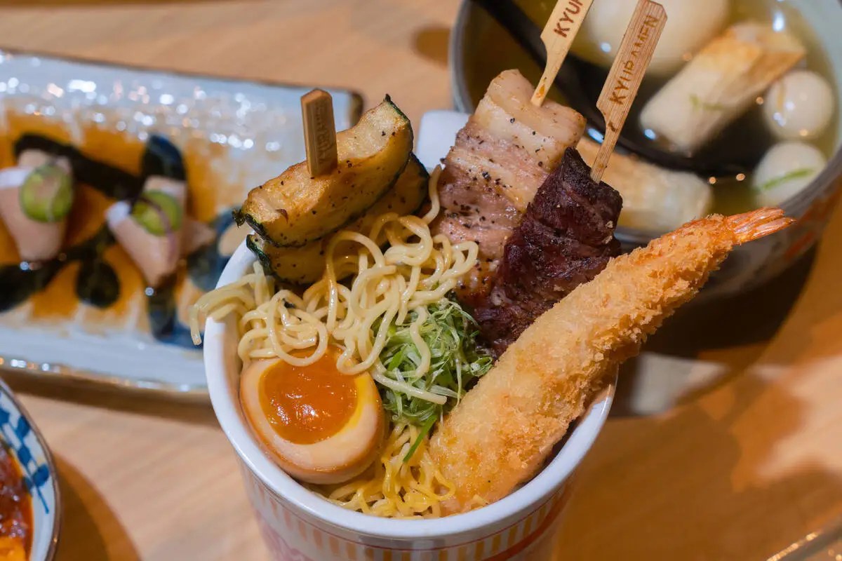 Ramen street cup and yakitori skewers at Super Kyuramen in Chinatown