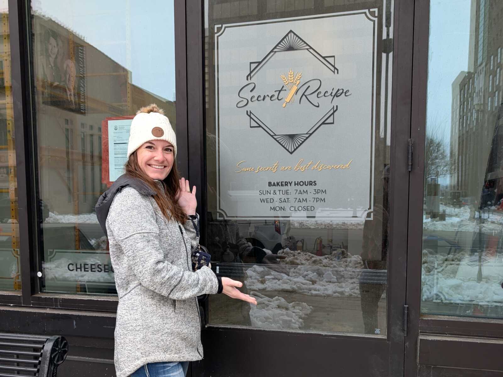 Secret Recipe bakery entrance on West Market Street, with the diamond logo on the glass
