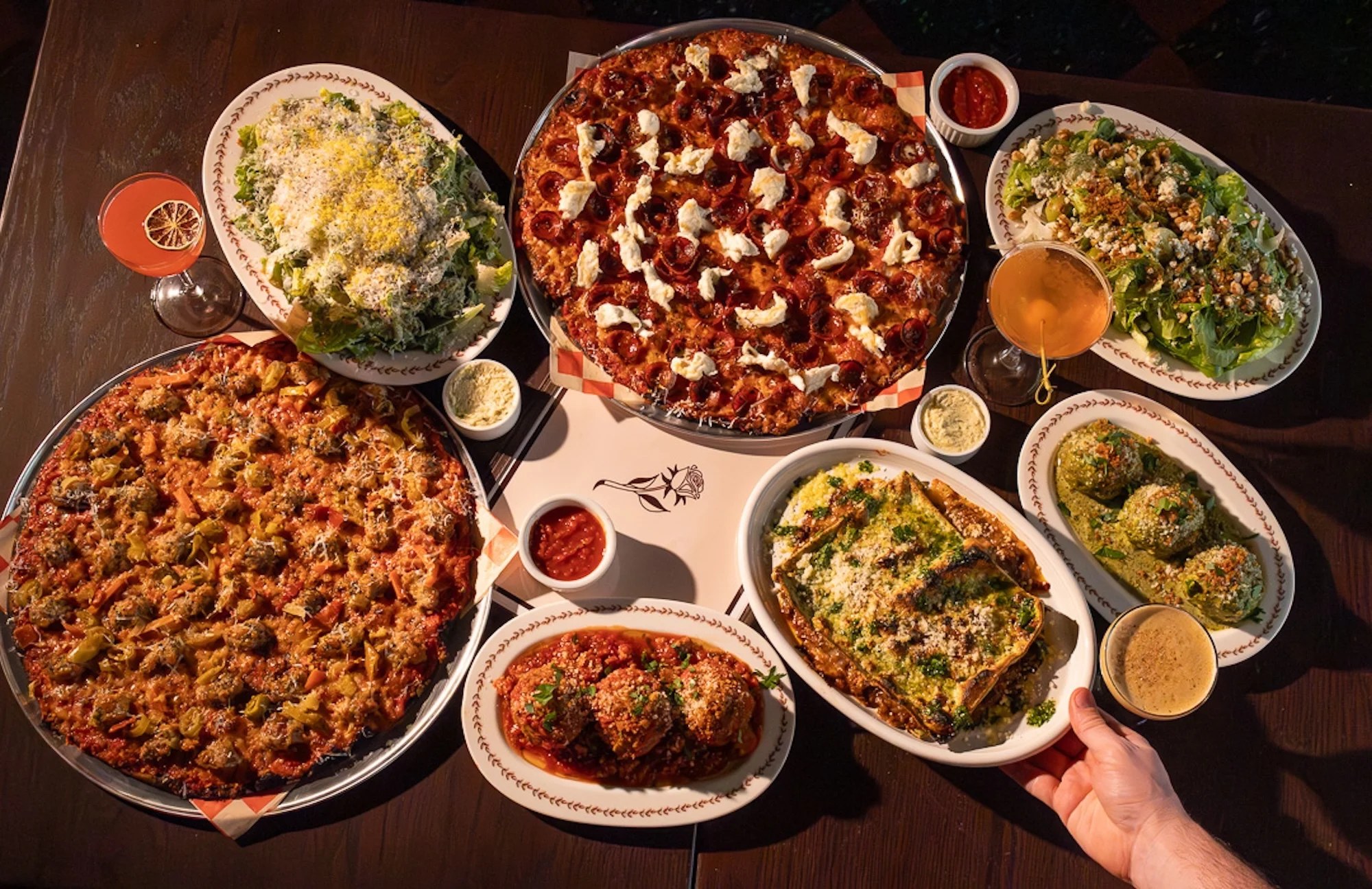Pizzas, meatballs, salad, and pasta at La Merna